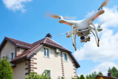 Drone Flying Near House