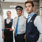 Pilot With Flight Attendants