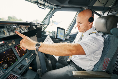 Experienced Aviator Checking Flight Controls